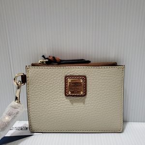 Dooney and Bourke pebble leather zip top card wristlet.